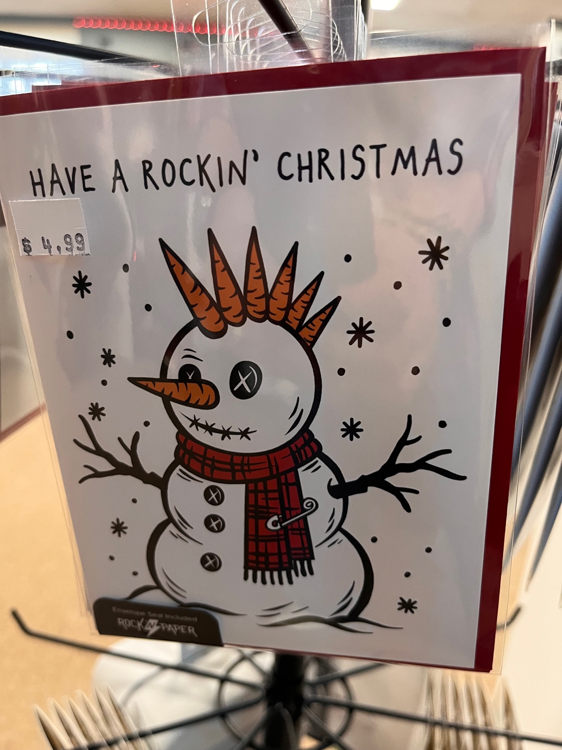 Rock-themed Christmas greeting card with a punk snowman at Nick & Tiff Music in Derby NY